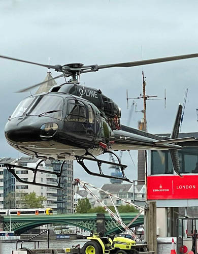 MCF Aviation helicopter landing at London heliport Battersea